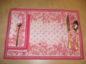 This is what your place setting looks like before you start. Napkin is under your fork. (Also, bless my mother for ensuring that I own a set of cloth napkins and placemats!)