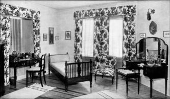 This is Emily Post's ideal guest room. I can't say I love her taste in curtains!